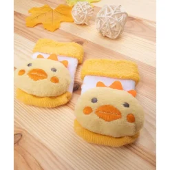 Prenatal Calcetines unisex con sonajero pollito