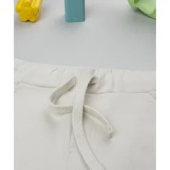 Prenatal Pantalones niño beige estampado relieve